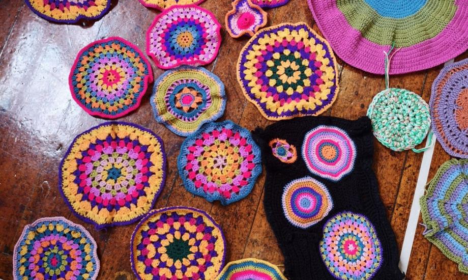 Image of a collection of brightly coloured crocheted mandalas 
