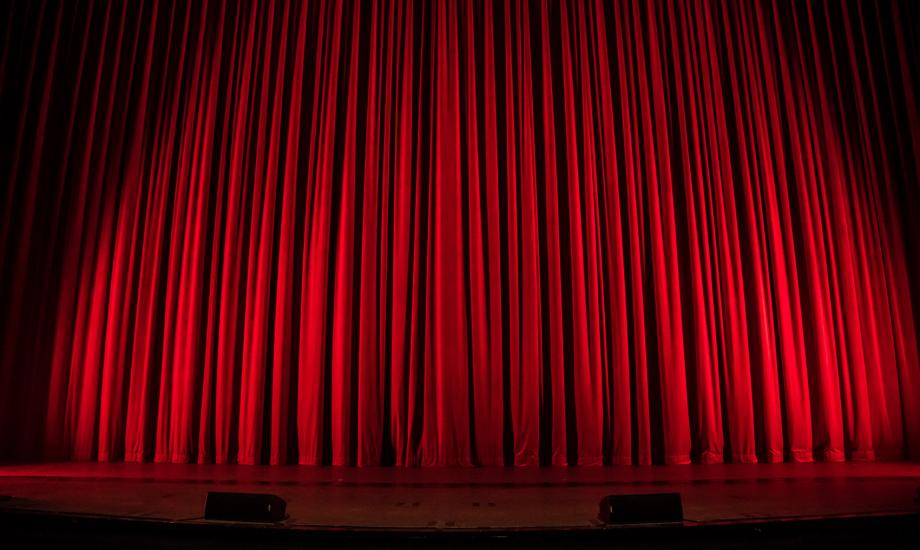 Image of a red theatre show curtain 